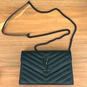YSL handbag.  Black leather with chain strap.